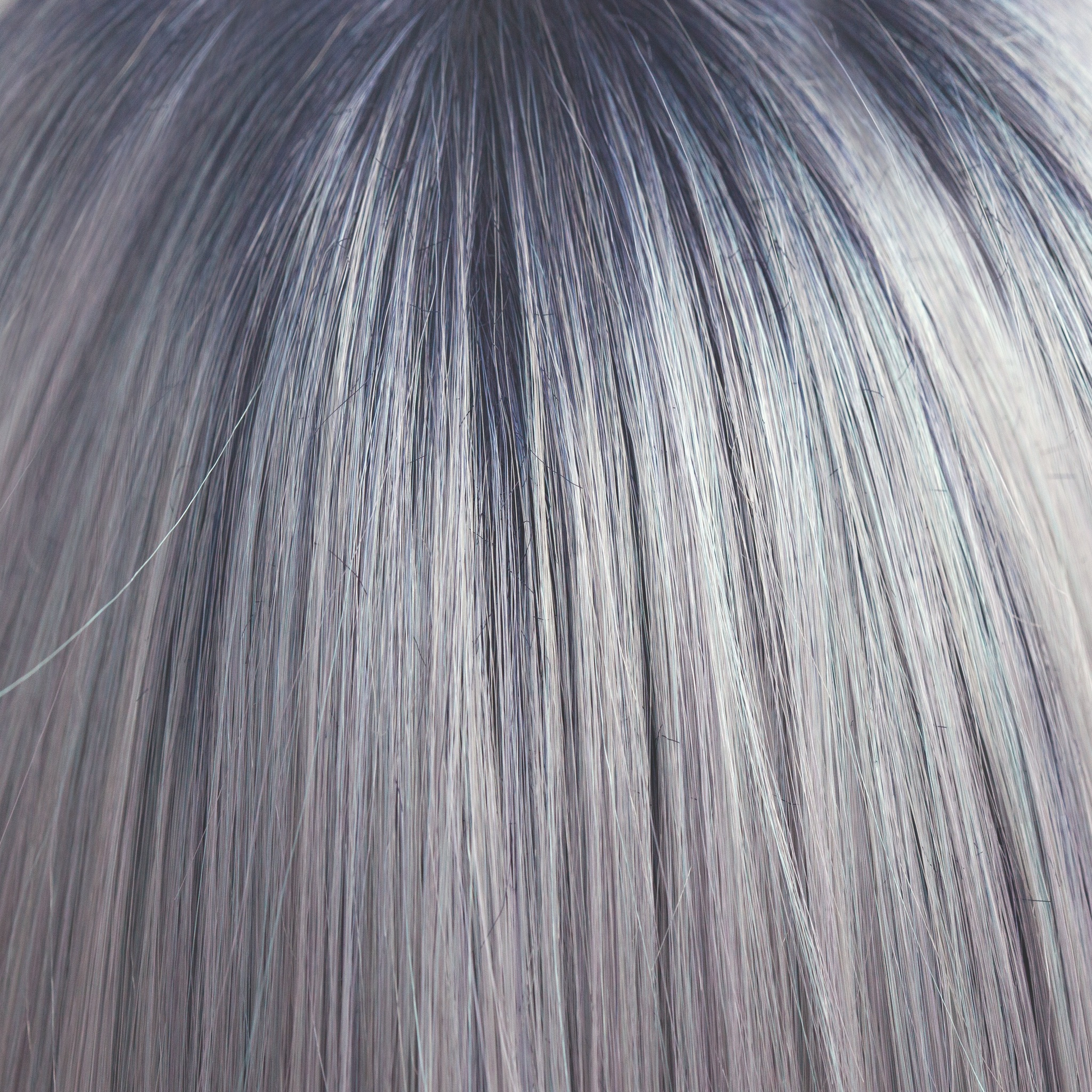 Pastel Blue-R  -  A cool pale pastel blue with hues of white. This Pastel Blue-R color has the palest of mineral blue highlights and silver shadows graduating from a dark blue sapphire root giving depth and definition.