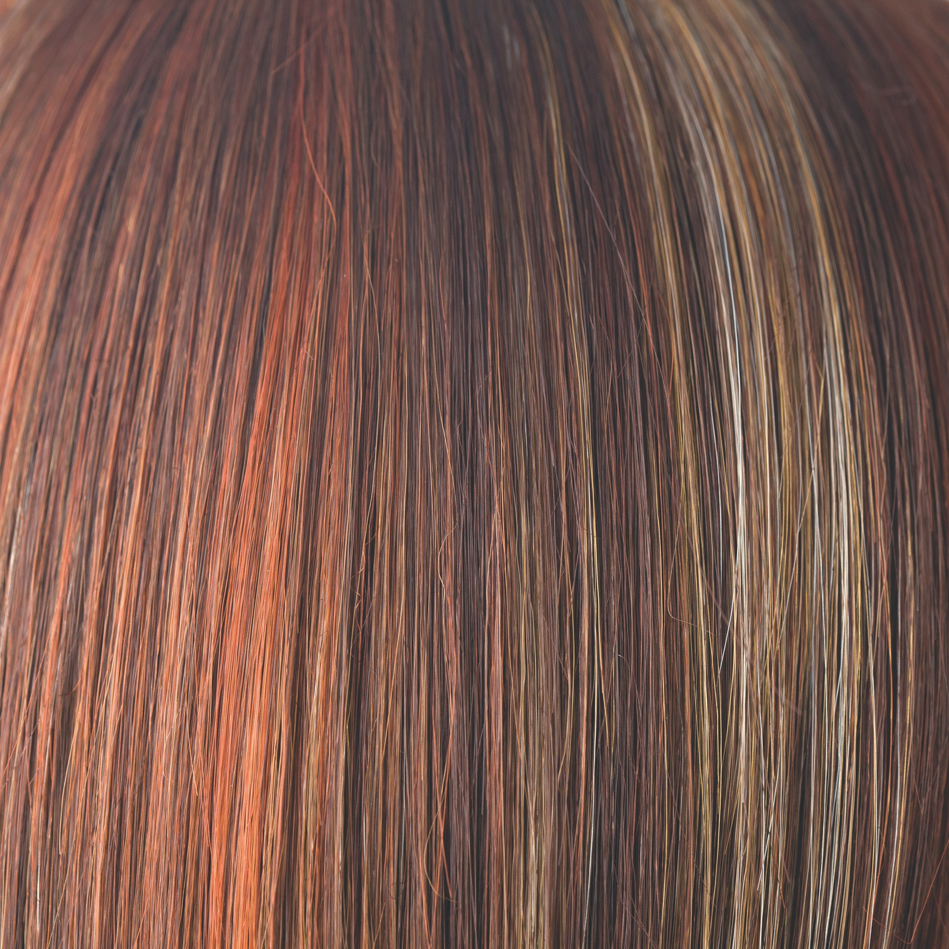 Razberry Ice  -  A dark raspberry brown base with scattered highlights of dark copper and ash pearl medium blond and rouge undertones. Razberry Ice is a much loved favorite.